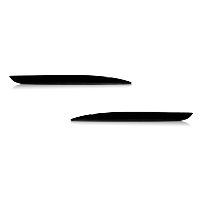 Black rear bumper reflector light covers for a Chrysler 300.