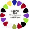 A circular arrangement of 100 assorted ABS guitar picks in various colors and three thicknesses: 0.5, 0.75, and 1mm.
