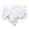 A pile of white disposable hair net caps for microblading and permanent makeup.