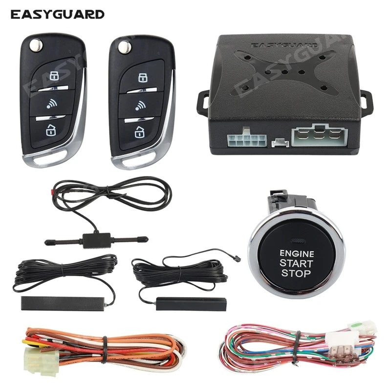 A set of keyless entry components including a remote, an ignition module, and various wiring harnesses for a PKE system.