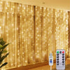 Golden sheer curtain fabric illuminated by warm white LED string lights in a room setting