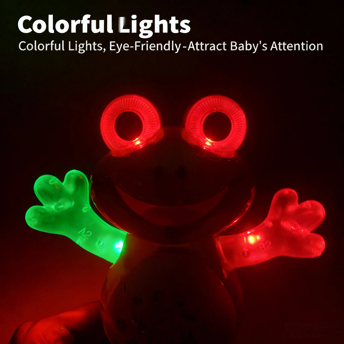 A bright red frog toy with glowing eyes and limbs is shown against a dark background.