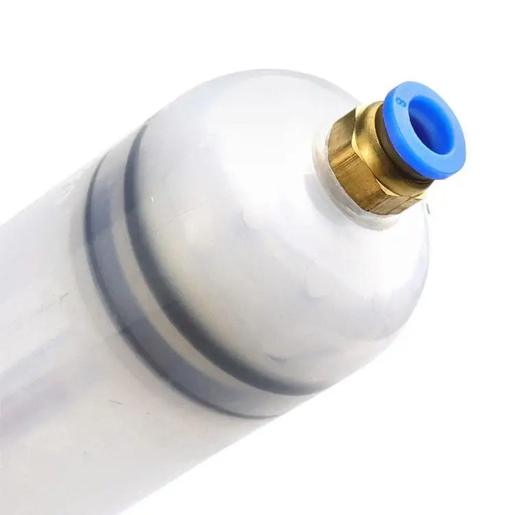 A white fluid transfer syringe pump with a brass fitting and a blue plunger cap.