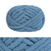 A ball of light blue chunky chenille yarn used for hand knitting and crochet