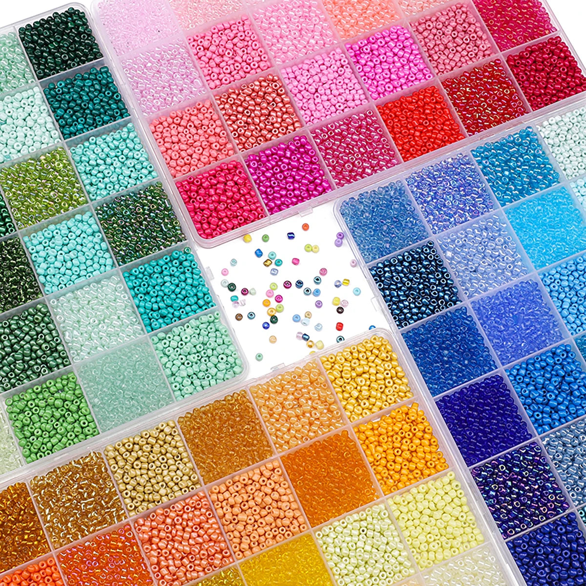 A grid of multicolor acrylic rice beads in various shades and colors stored in a transparent box.