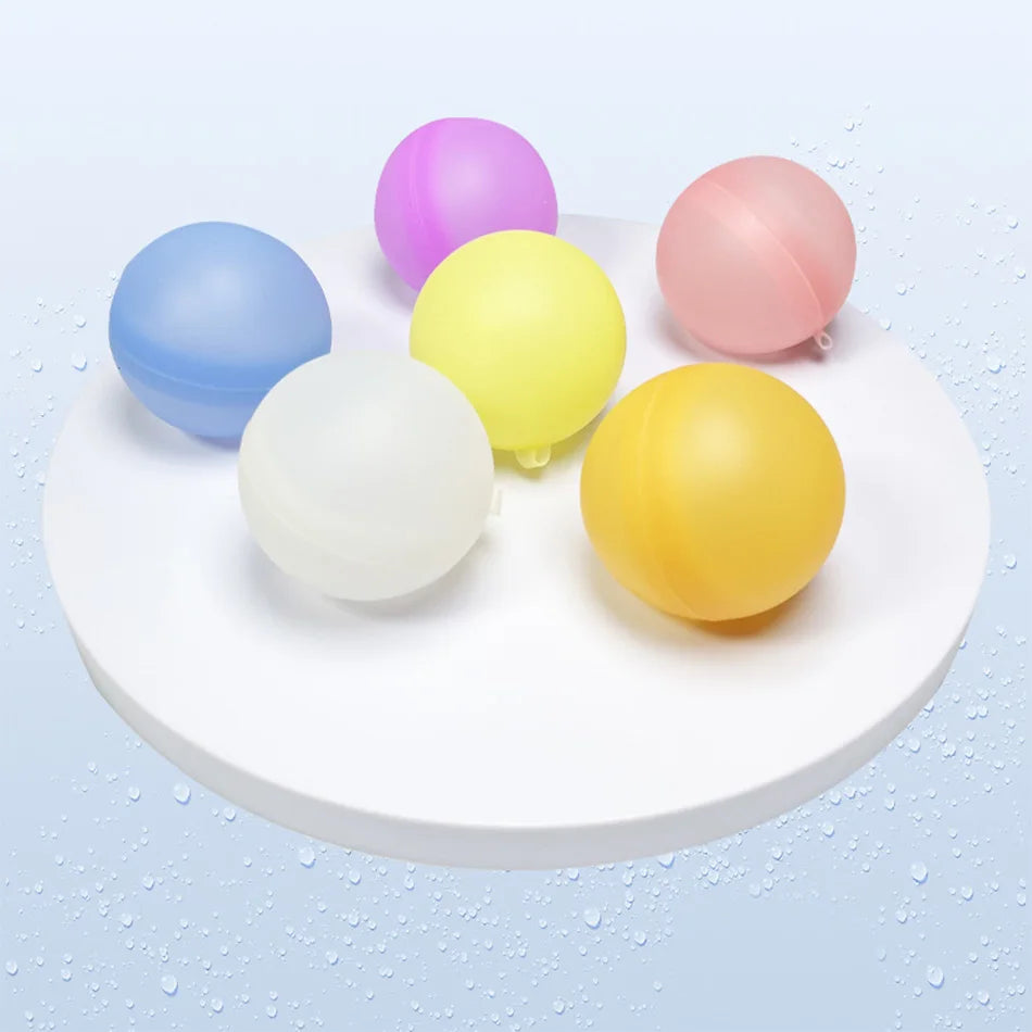 A collection of colorful reusable splash water balloons in various shades including purple, blue, yellow, and pink resting on