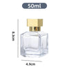 A clear glass perfume bottle with a gold-colored cap and sprayer, labeled as a 50ml refillable bottle.