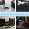 A braided 6.35mm guitar cable with a right-angle connector is shown connected to an Omso personal guitar amplifier.