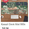 A desk mat featuring a nature design, used as an extended mousepad for a computer.