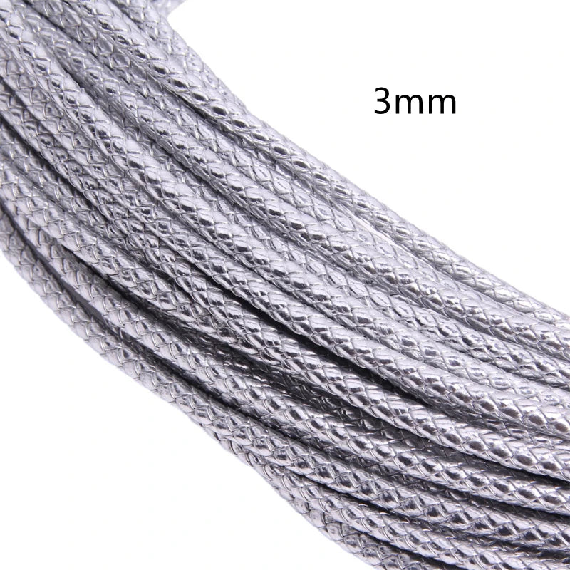 Close-up of a silver braided leather cord, 3mm in diameter, shown in a diagonal view.