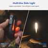 A hand holds a Wuben X4 compact flashlight demonstrating its RGB side light feature, showing warm and cool light options.