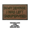 Dark olive embroidered patch with the text IN MY DEFENSE I WAS LEFT UNSUPERVISED