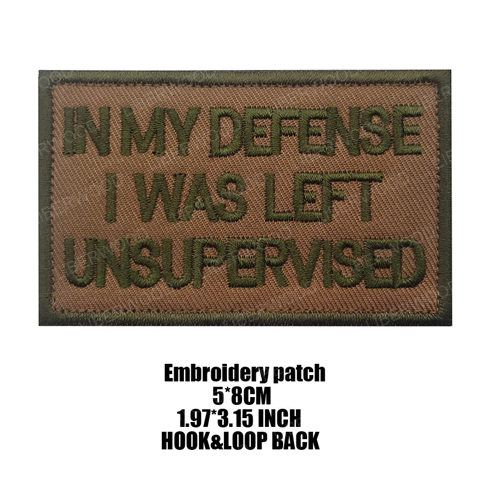 Dark olive embroidered patch with the text IN MY DEFENSE I WAS LEFT UNSUPERVISED