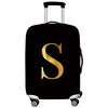 Black rolling luggage with a gold letter S print