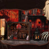 A DIY wooden book nook kit featuring a spooky Halloween miniature shelf insert with LED lights and decorative elements.