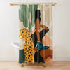 A shower curtain featuring a large print of a woman and a leopard, in shades of olive green, brown, and beige.