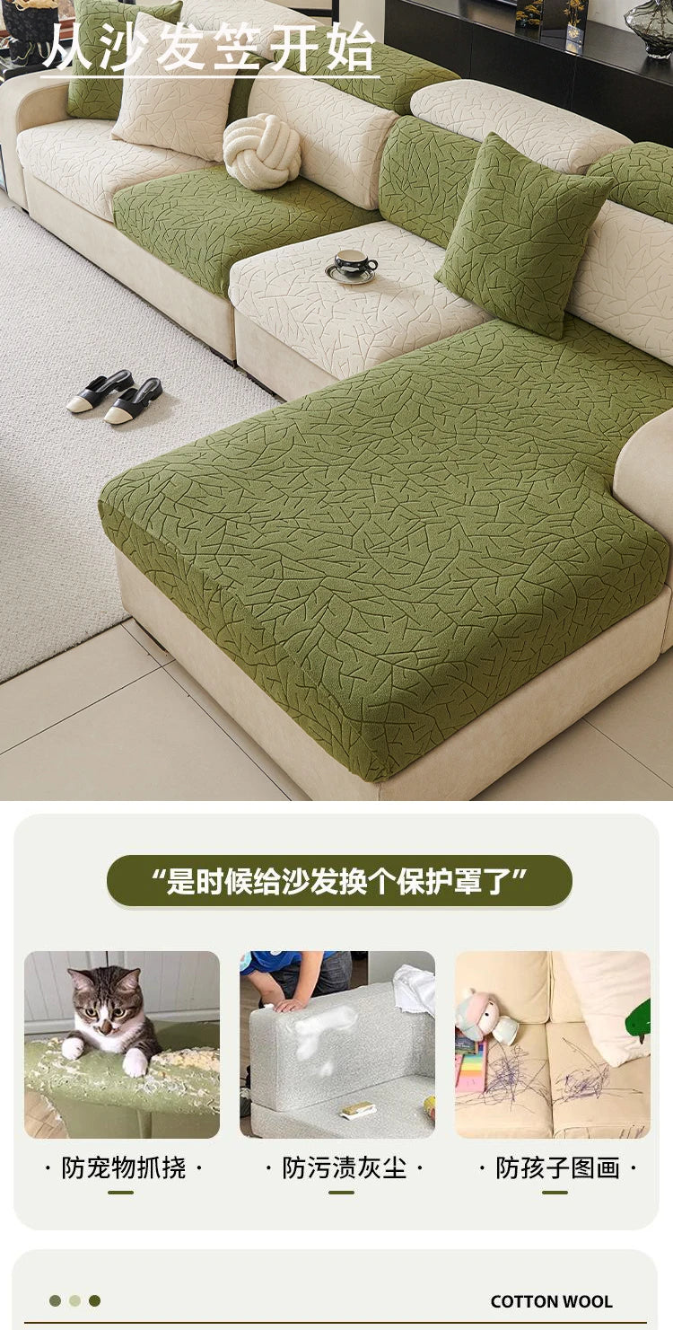 A light green jacquard fleece sofa cover with a textured pattern displayed on a beige sofa.