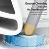 A toilet brush cleaning tool is shown removing dirt from corners and crevices on a blue surface.
