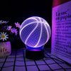 A glowing blue wireframe sphere representing a basketball is displayed on a dark surface.