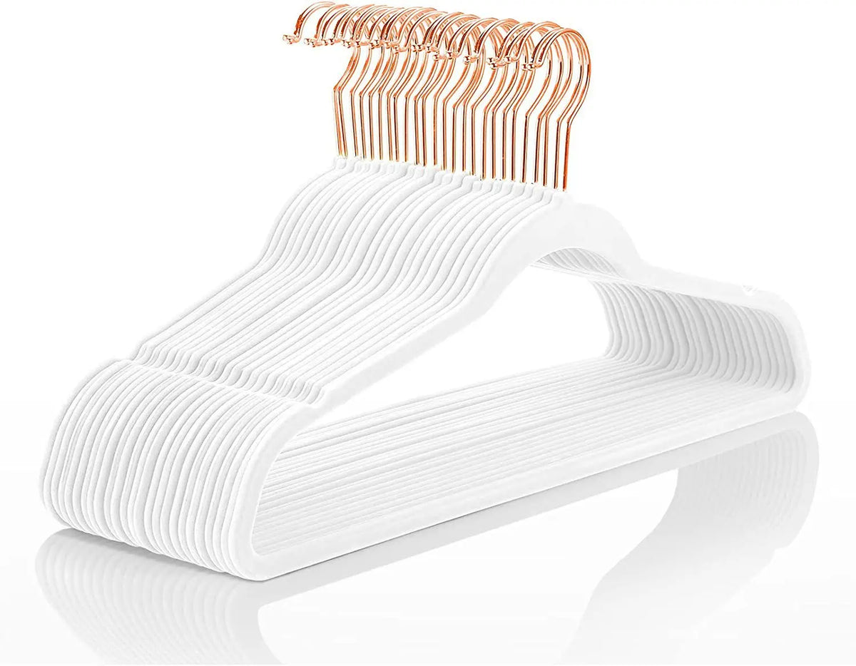 White velvet hangers with 360 degree swivel hooks for clothing