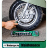 A hand holds a chrome vanadium socket set with a quick-release ratchet on a tire rim for motorcycle maintenance.