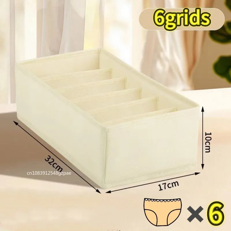 White fabric organizer with six compartments for drawers and closets