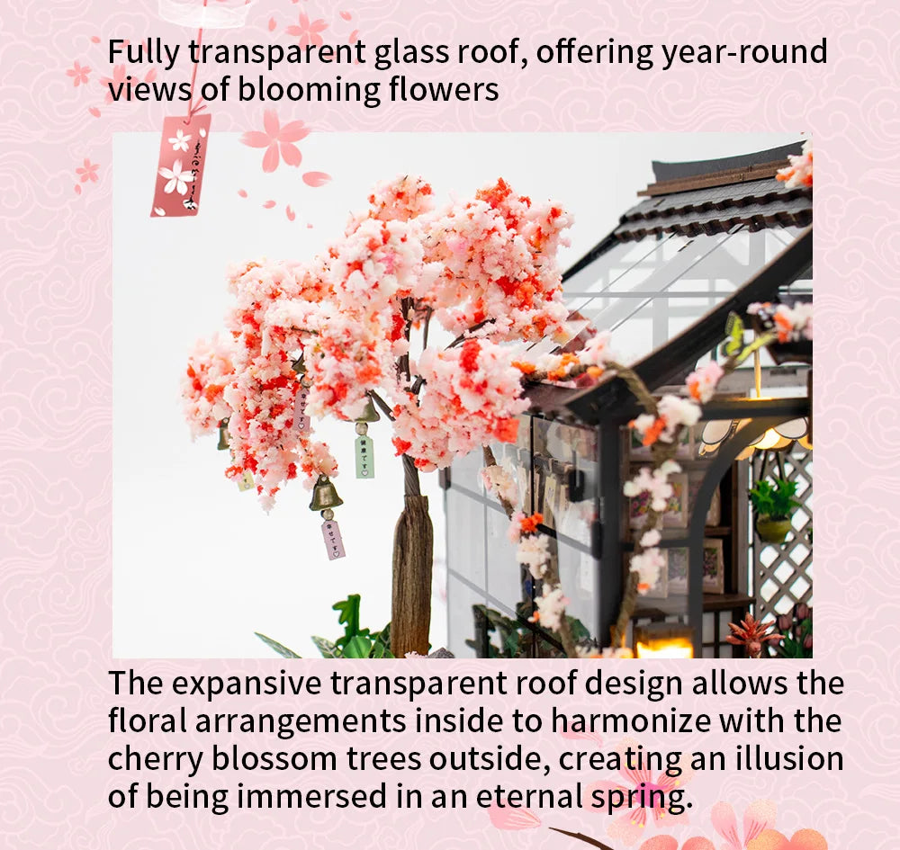 A transparent glass roof structure showcasing blooming pink cherry blossom trees and floral arrangements.
