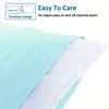 A close-up view of a light blue microfiber pillowcase, showing the envelope design and white inner layer.