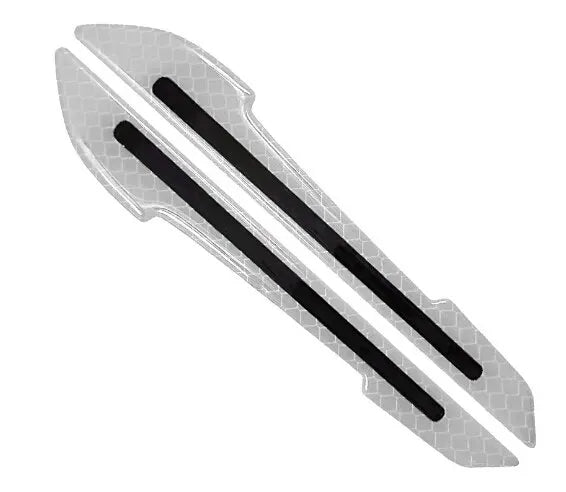 A set of reflective safety strips designed for car mirrors, featuring black lines on a clear plastic background.