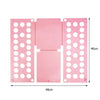 Pink plastic clothes folding board with multiple holes for organizing shirts and t-shirts