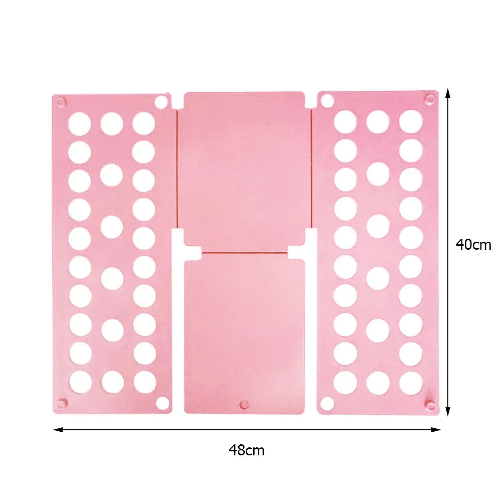 Pink plastic clothes folding board with multiple holes for organizing shirts and t-shirts