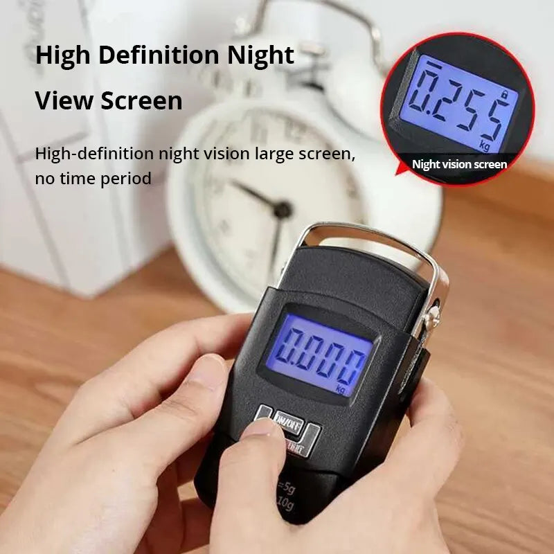 A hand holds a black portable digital luggage scale with an LCD display showing 0.000 kg.