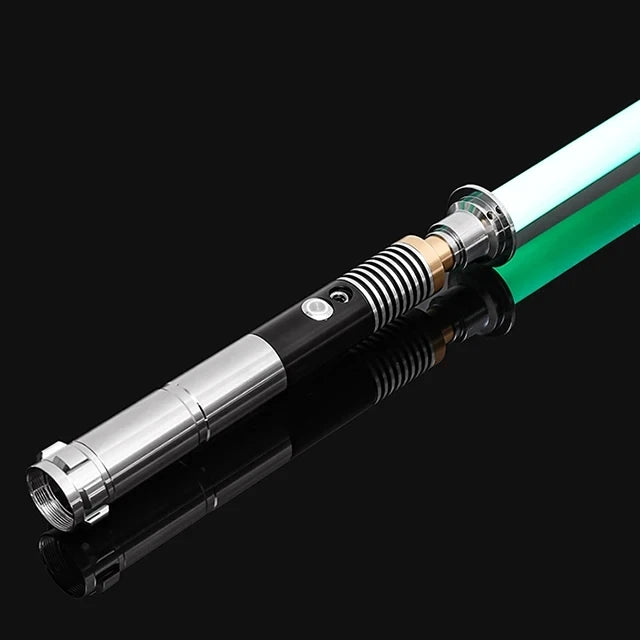 An RGB metal lightsaber with a glowing green blade and silver hilt, shown against a black background.