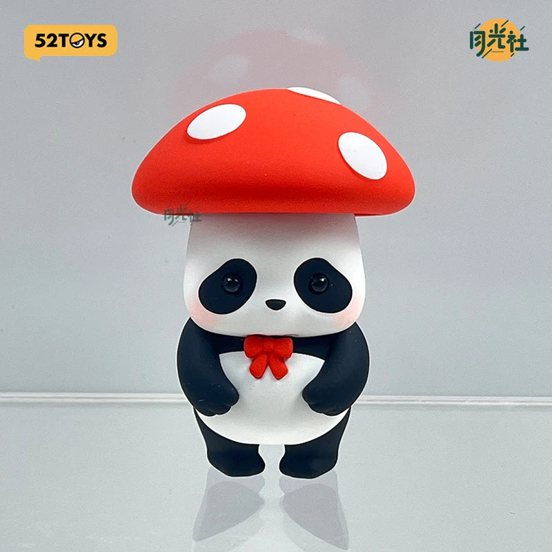 A blind box figure of a panda with a red mushroom cap and a black bow tie.