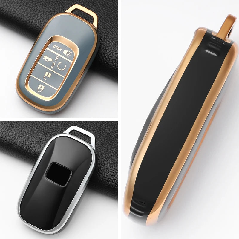 A close-up view of a black Honda key fob cover with a gold accent, shown in two different angles.