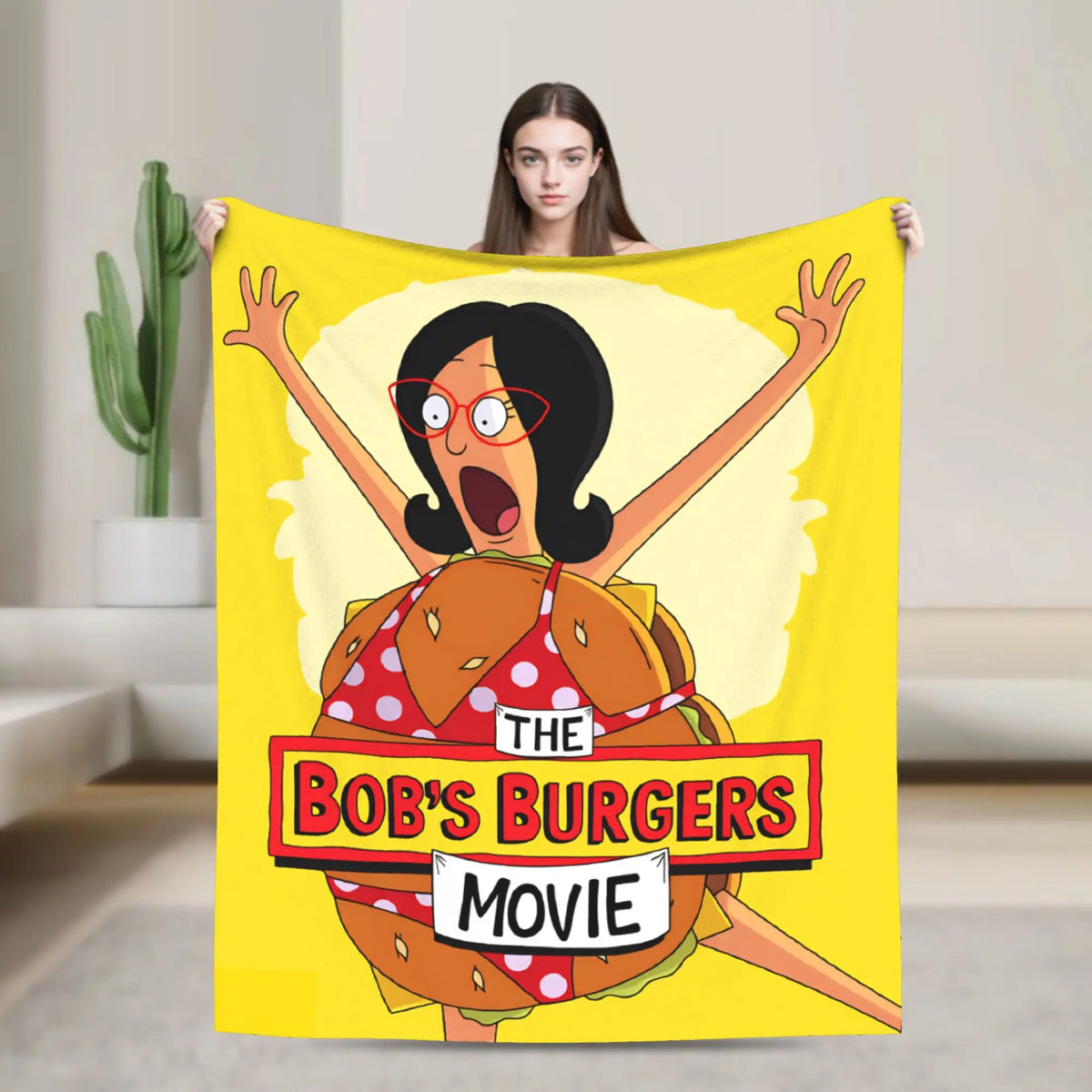 A cartoon illustration of a woman with dark hair and glasses excitedly holding a large burger, set against a yellow backgroun