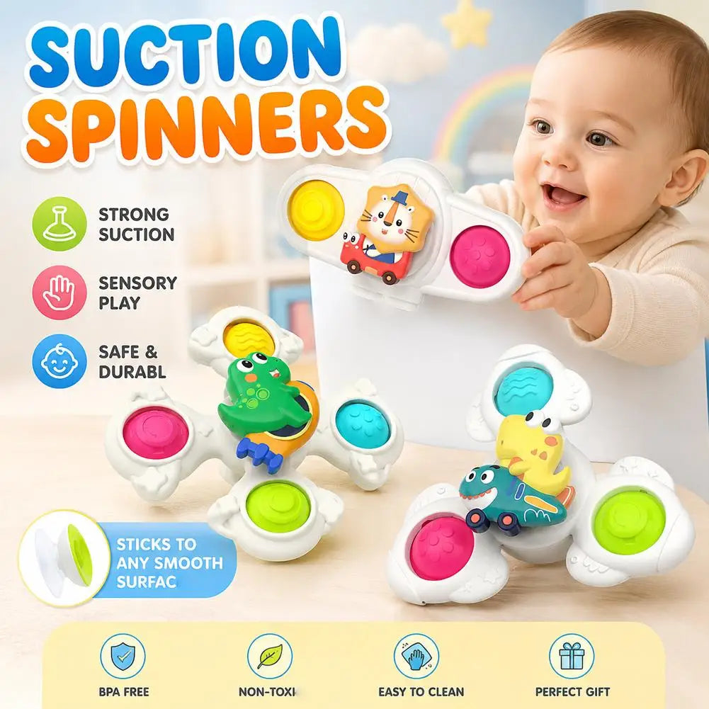 A baby is playing with suction spinner toys designed for sensory play and teething.