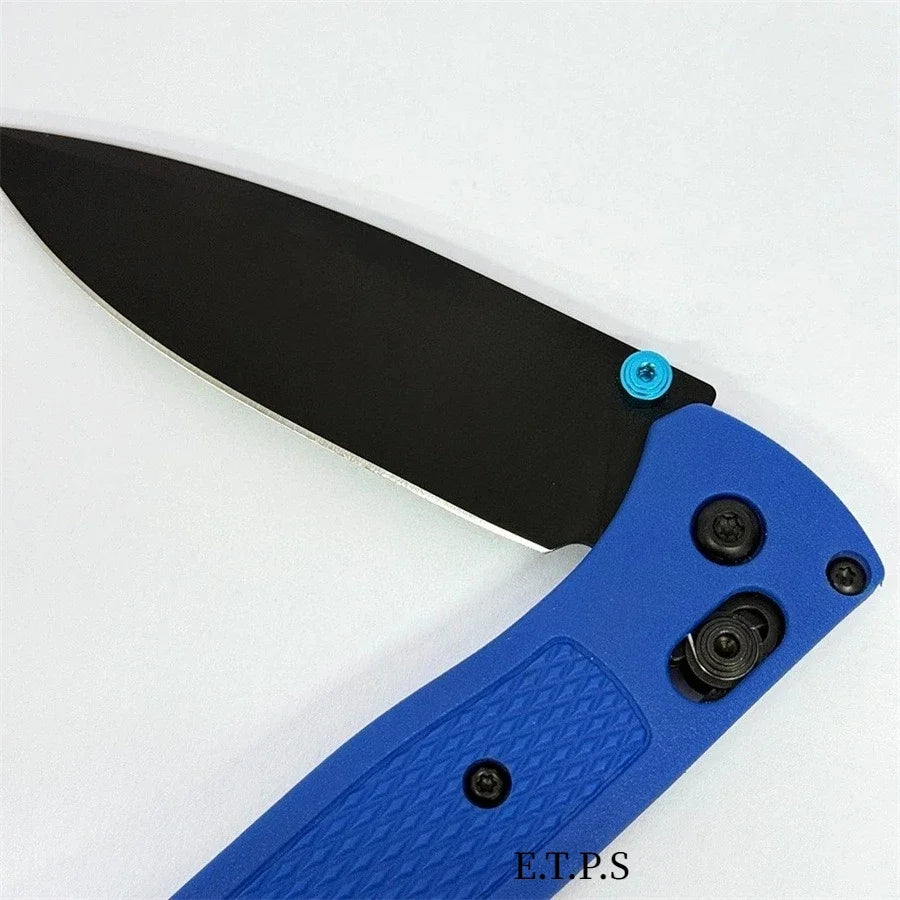 A black folding pocket knife with a drop point blade and blue handle is shown from the side.