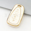 A white and gold durable TPU key fob cover for a Chevrolet vehicle.