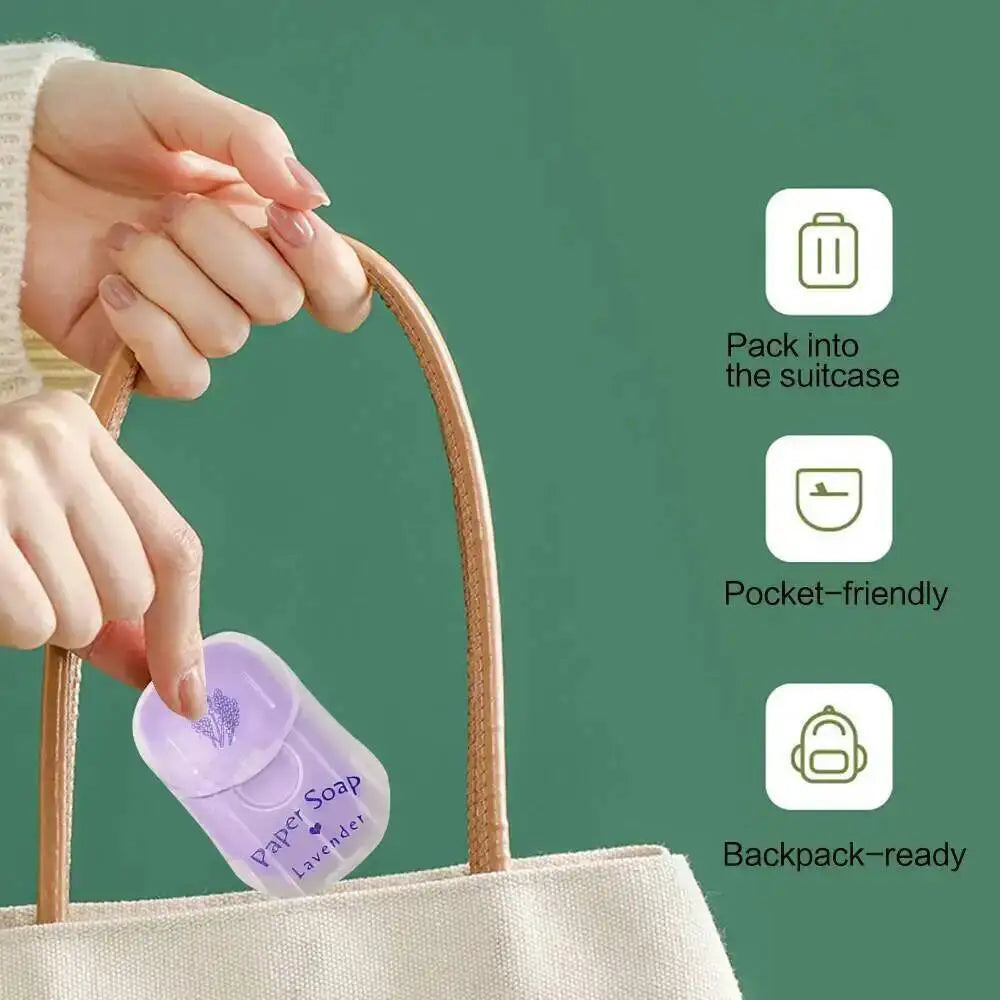 A hand is placing a purple paper soap into a woven tote bag, demonstrating its portability.