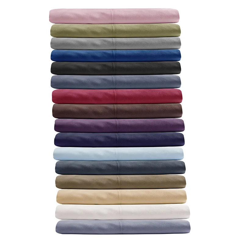 A stack of twelve soft brushed microfiber pillowcases in various muted and deep colors.