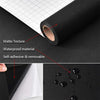 Roll of matte black waterproof self-adhesive vinyl wallpaper showing texture and peel-off capability