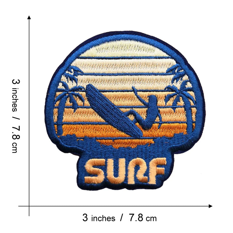An embroidered patch featuring a silhouette of palm trees and a wave design on a dark blue background.