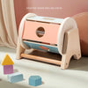 A wooden desktop shape rolling drum toy featuring colorful blocks and a soothing ring.