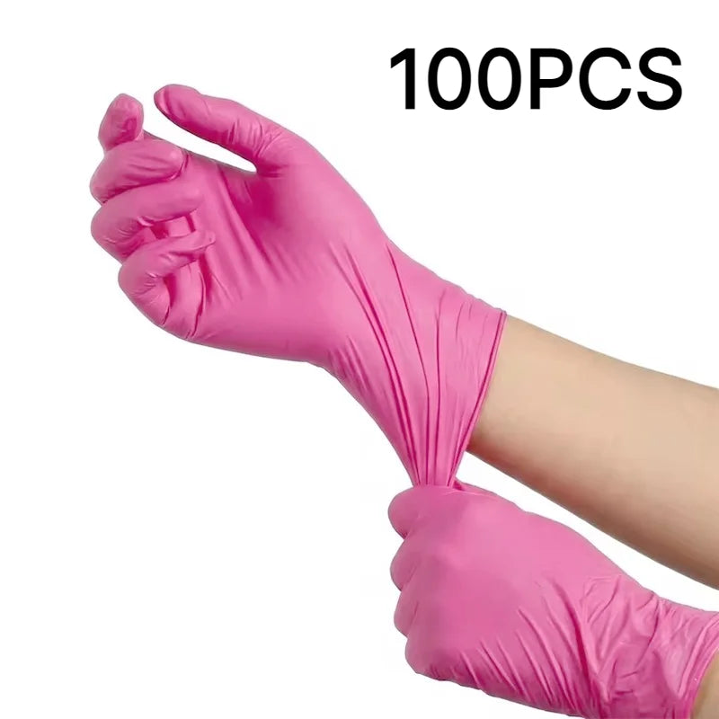 A hand wearing a bright pink disposable nitrile glove is shown, with the text 100PCS visible.