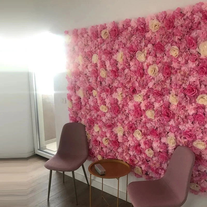 A vibrant pink silk rose flower wall panel covering a wall in an indoor setting.