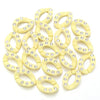 A set of twenty yellow acrylic jewelry connector clasps with crystal accents.
