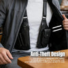 A black leather crossbody bag is shown being held inside a gray jacket, highlighting its anti-theft design.