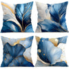 Abstract leaf print cushion cover featuring blue and white watercolor leaves with gold accents