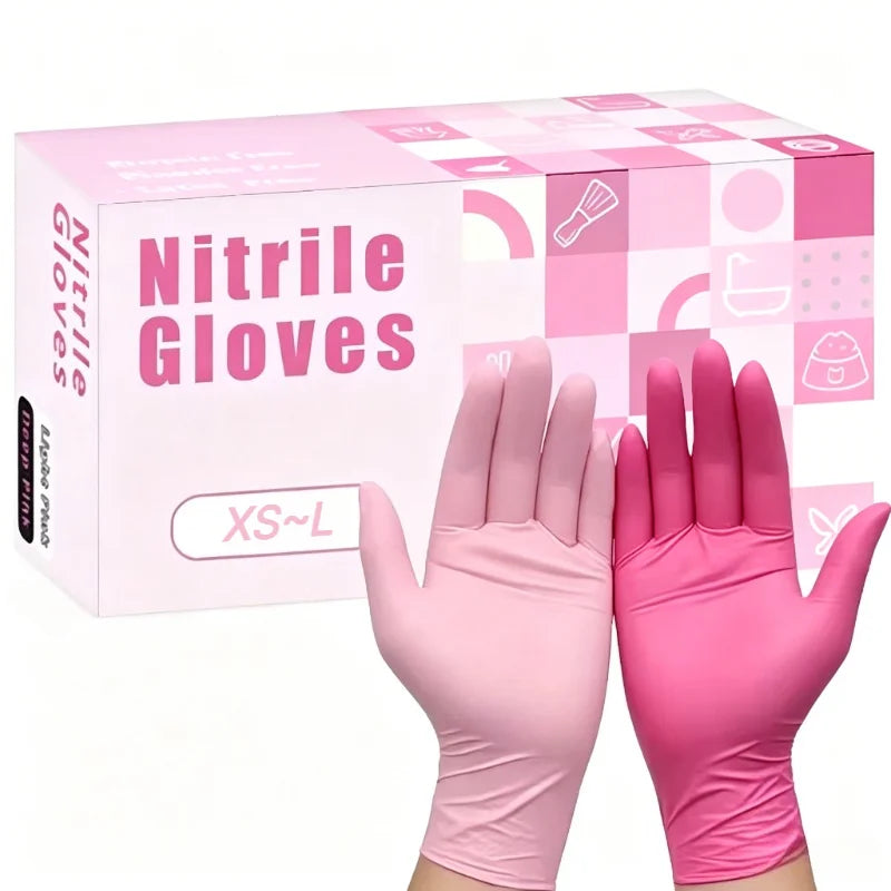 Box of pink nitrile gloves with a hand wearing a pair for household use